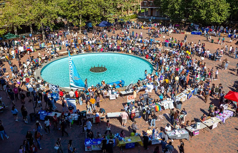 Many students gathered in Red Square around the fountain for an info fair, overhead drone photo