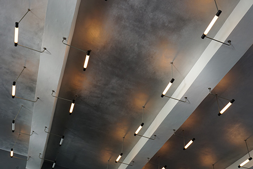 A metal ceiling with light fixtures