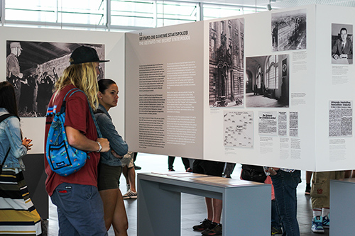 Two students reading a museum display