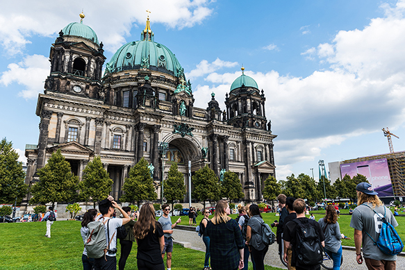 a photo of students looking at the berliner dome