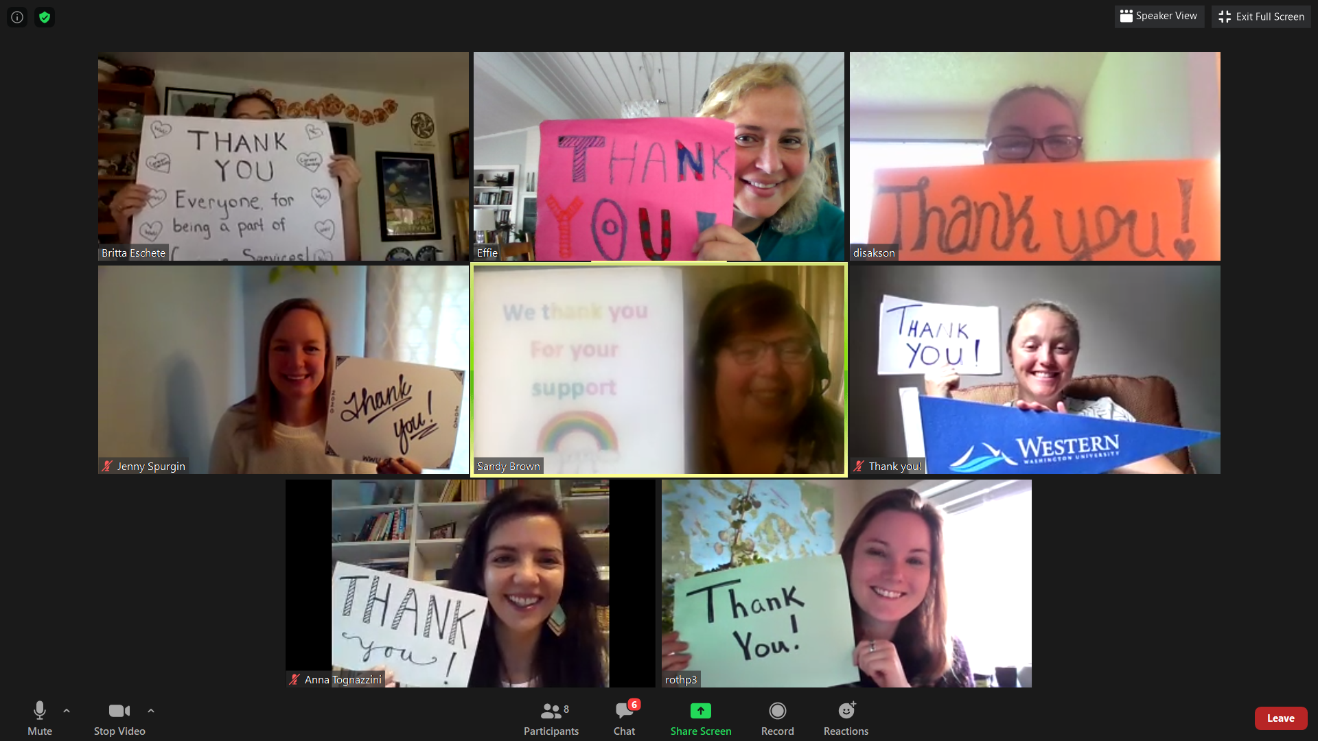 Career Services Center staff on zoom holding handwritten "thank you" signs