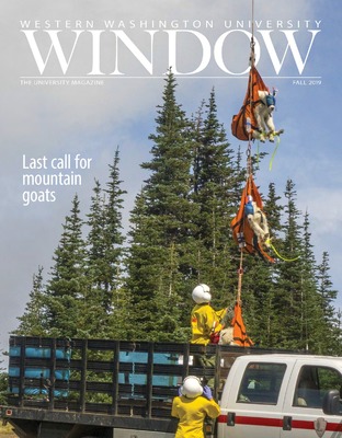Cover of Western Washington University's Window Magazine picturing goats being lifted in the air.