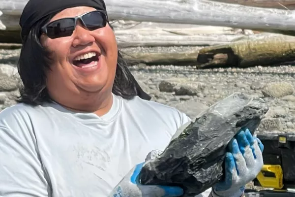 Michael Sheena of the Pauquachin First Nation, in North Saanich, British Columbia, helps the Swinomish Tribe build a rock wall on Kiket Island, Washington.
