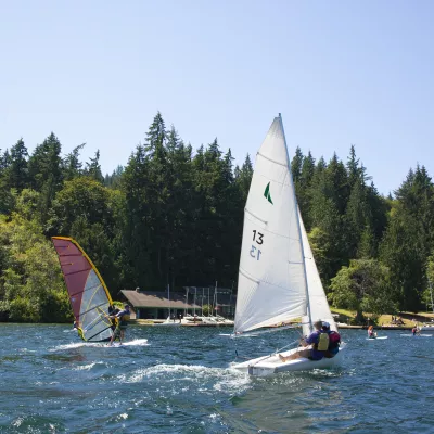 Student sail sailboats on Lake Whatcom.