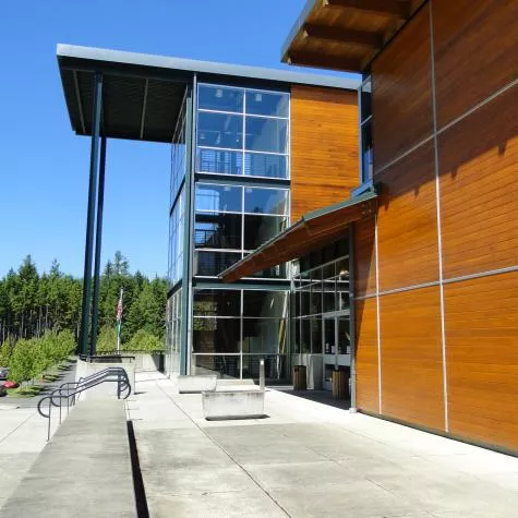 Exterior of WWU OC- Poulsbo building, which features a glass facade.
